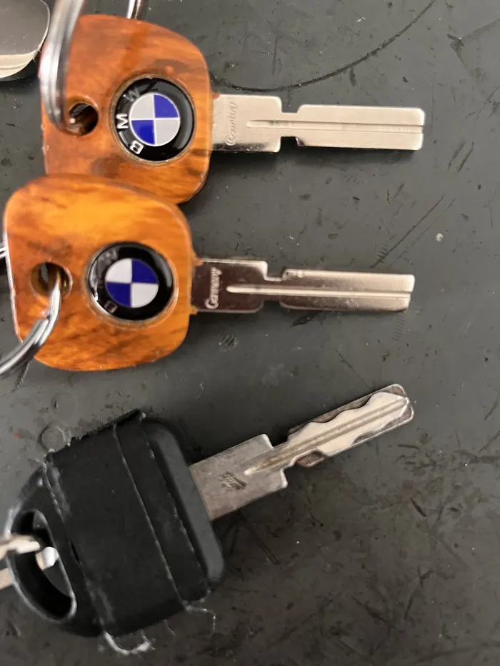 BMW keys and a remote key ready for a customer