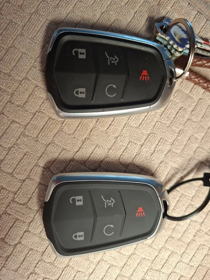 Two Cadillac smart keys