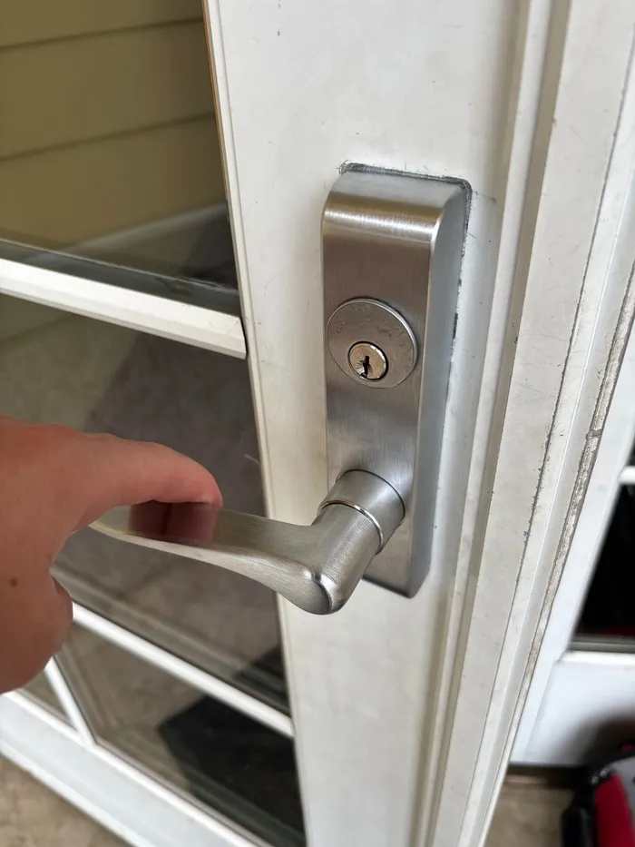 Mortise lever lock on a commercial door