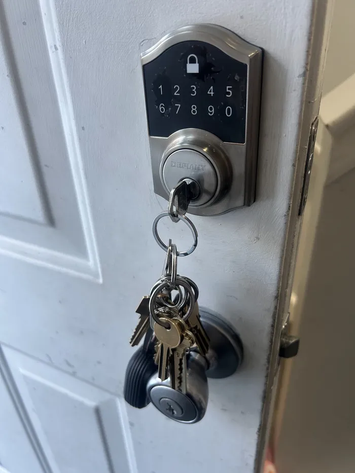 Keypad deadbolt with keys in the lock