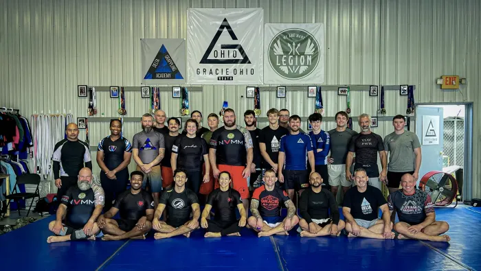 No-gi jiu-jitsu class in rash guards under the Gracie Ohio and Legion Project banners