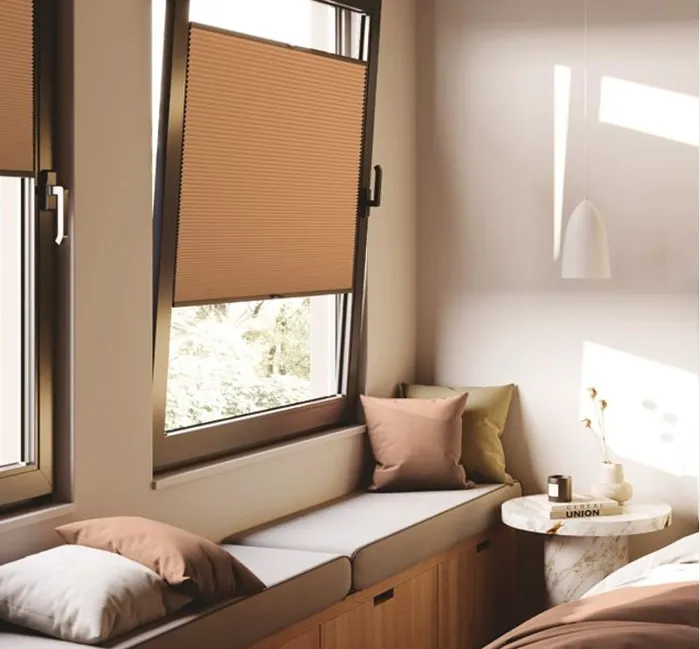 Pleated blind on a tilt and turn window over a window seat, Eclipse SBC serving Doncaster