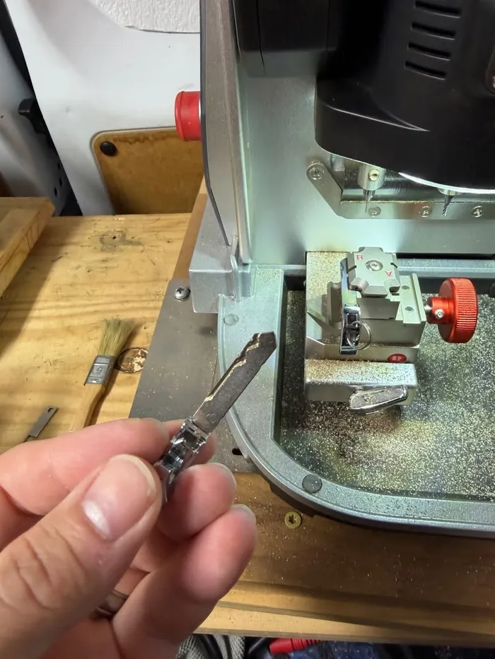 Cutting a key blade on a key duplication machine