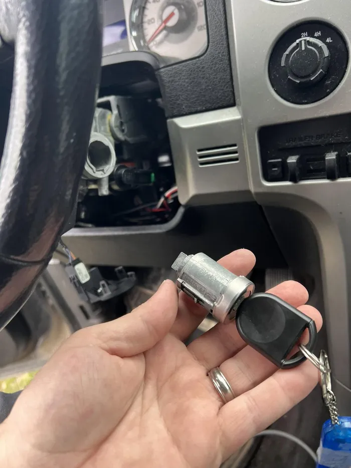 Ignition lock cylinder removed from a steering column during an ignition repair