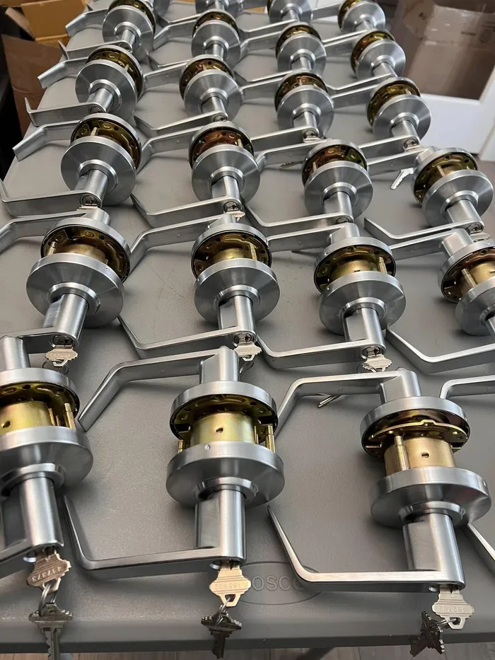 Commercial lever locks with keys laid out on a table