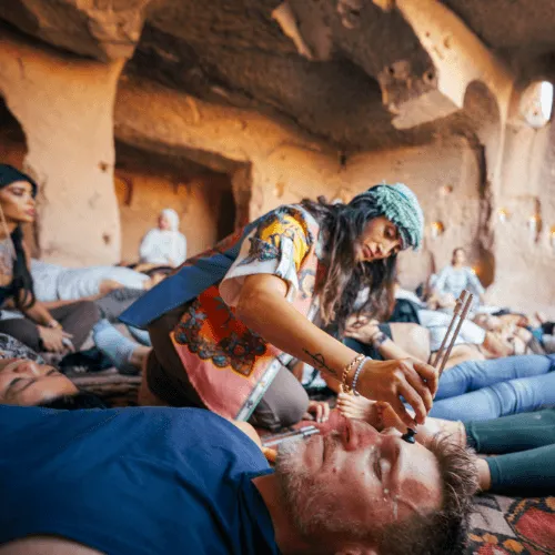 A breathwork session inside a cave