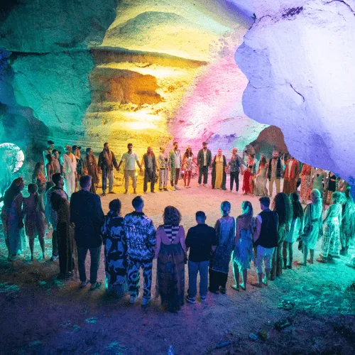 A circle of people holding hands