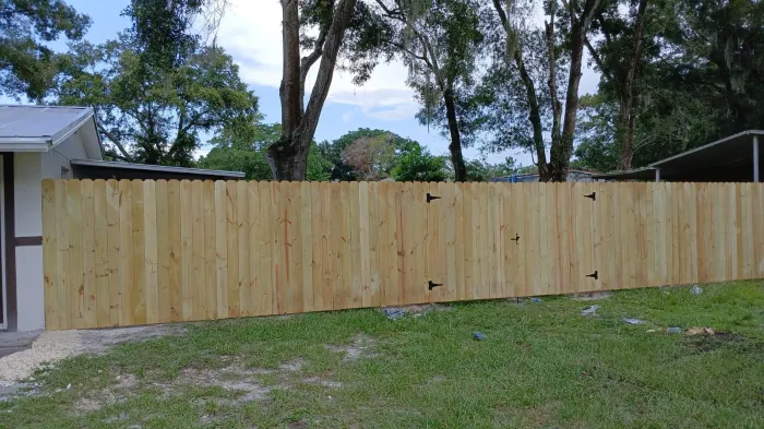 Wood privacy fence with gate