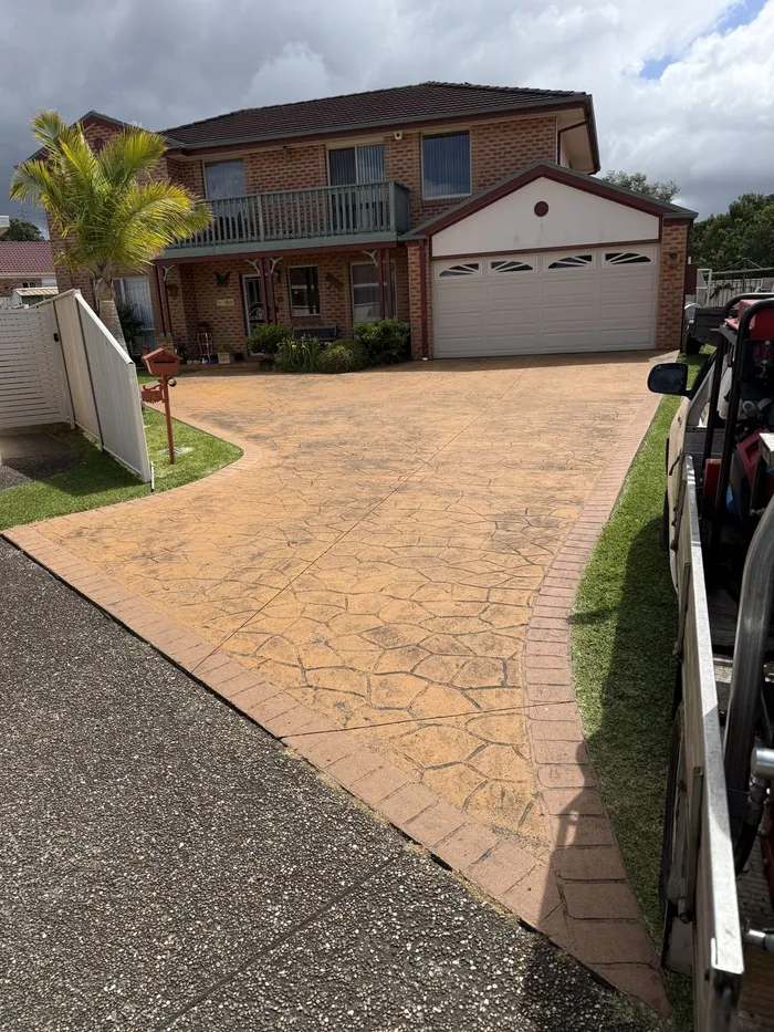 Stamped concrete driveway before cleaning