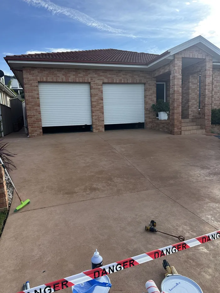 Double garage concrete driveway before cleaning