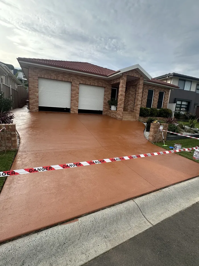 Double garage concrete driveway after cleaning