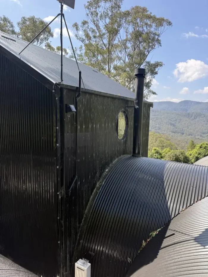 Black cabin cladding before cleaning