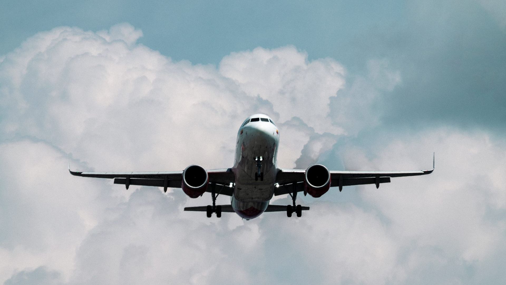 An airliner climbing after take-off — Mashamba's Entebbe to London air route briefing for produce buyers