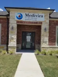 Medivira clinic front of building showing signage with Medivira name, phone number and address in Frisco TX