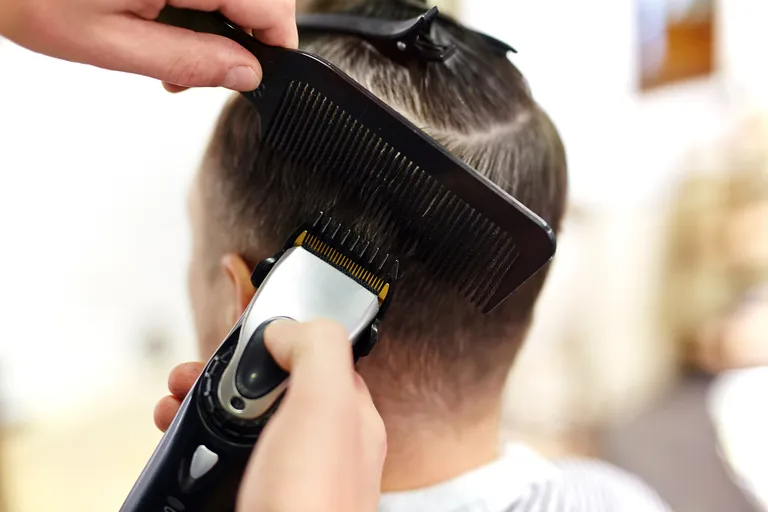 Clipper and comb fade work at Salon Salman