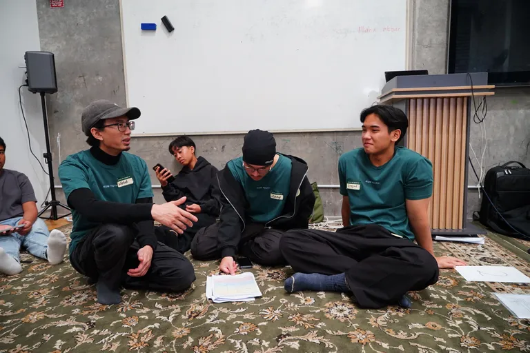 Youth leaders running a circle discussion