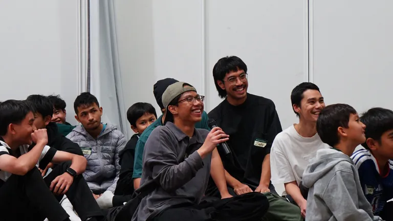 Brothers laughing together during a session