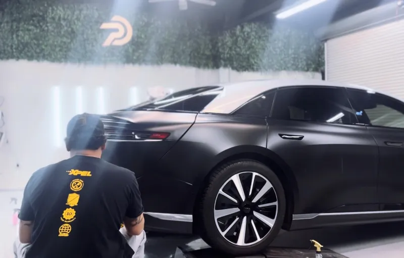Satin matte stealth paint protection film on a Lucid Air