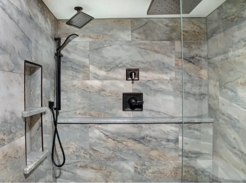 Bathroom remodel with custom tile and vanity by CTC Design & Renovation
