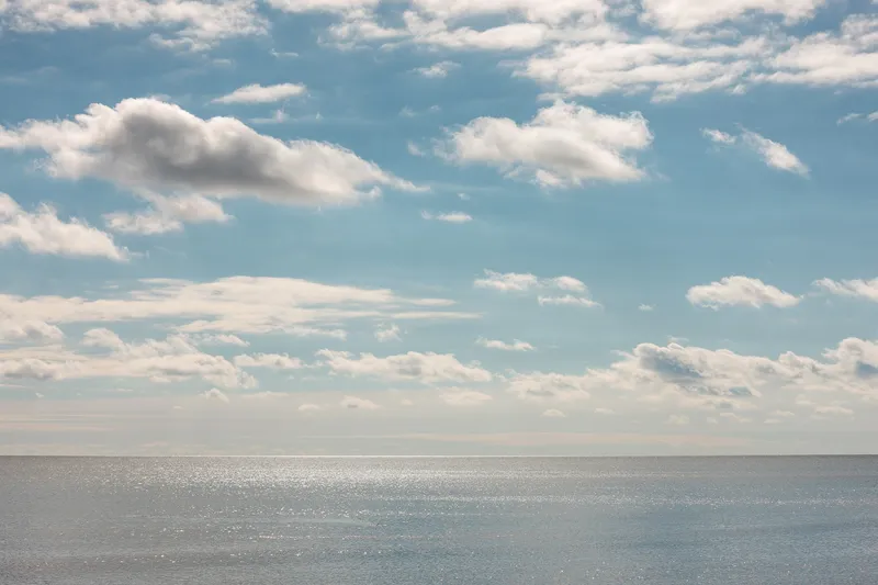 CLOUDS DRIFTING OVER LAKE MICHIGAN