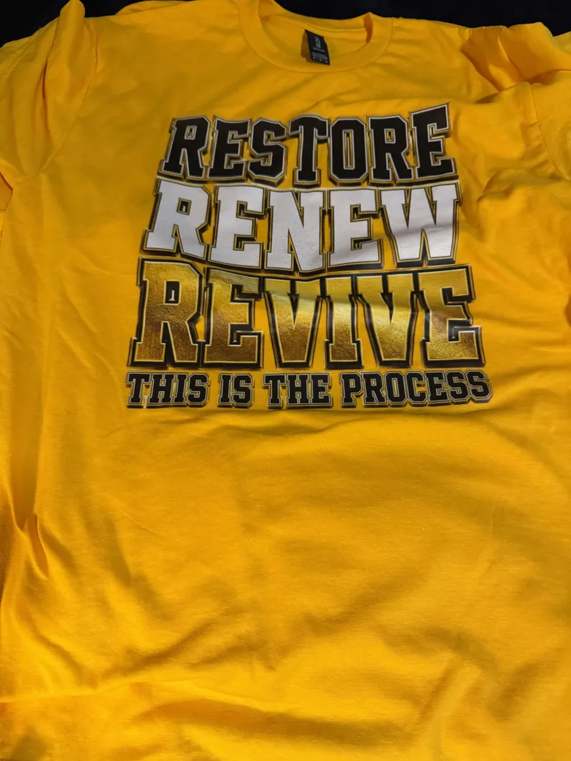 $25 - Restore Renew Revive– “This Is The Process” Premium Tee (Gold Edition)
