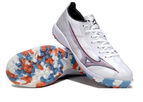 17. Mizuno TF – Blanco/Multicolor