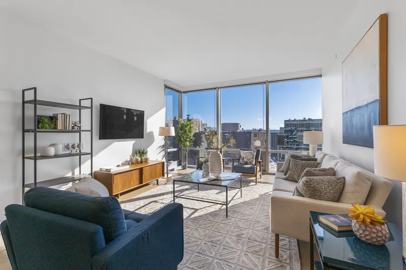 Condo living room with a city view