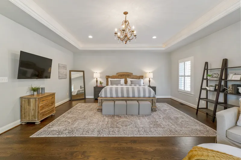 Bedroom with a chandelier