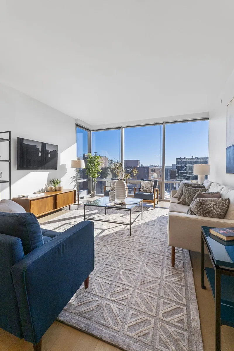 Condo living room with floor-to-ceiling windows