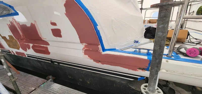 Fairing compound across the aft hull section