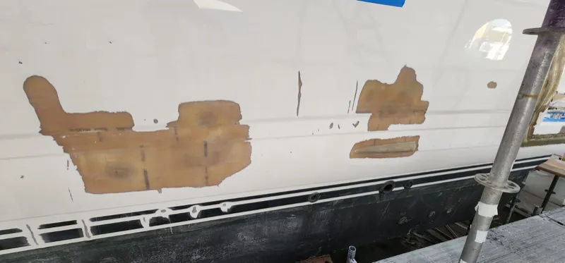 Spot repairs ground out along the hull