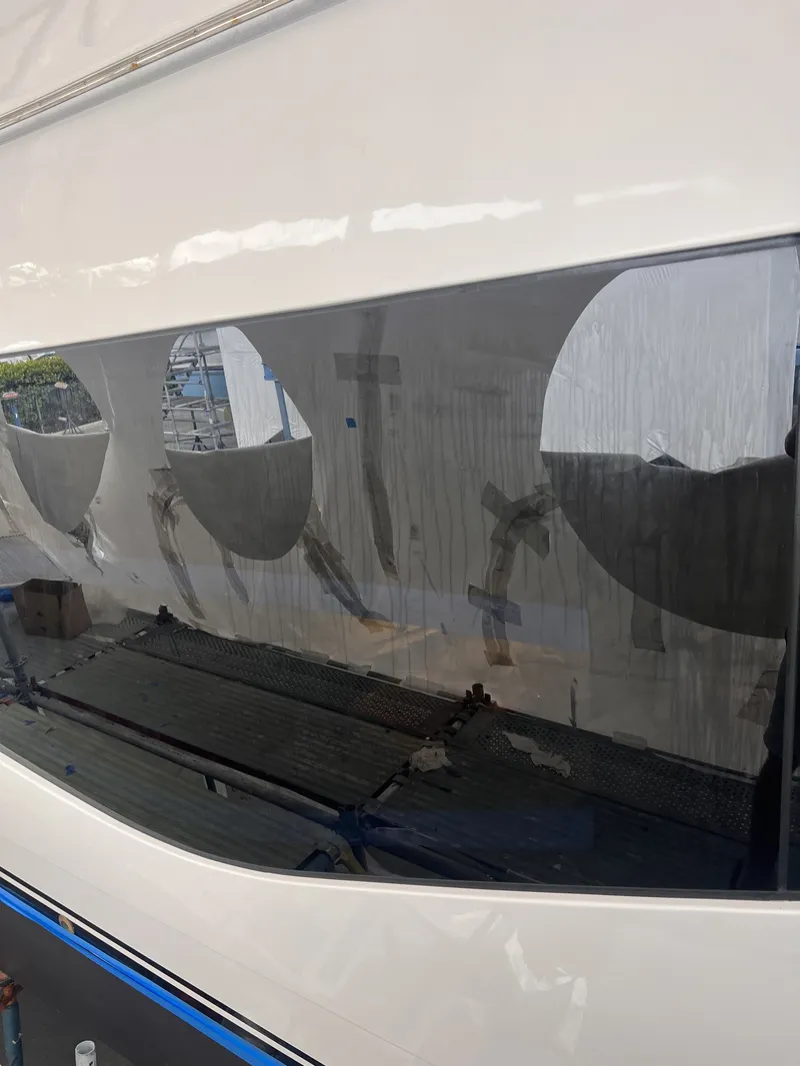 New hull window bonded and finished flush with the hull
