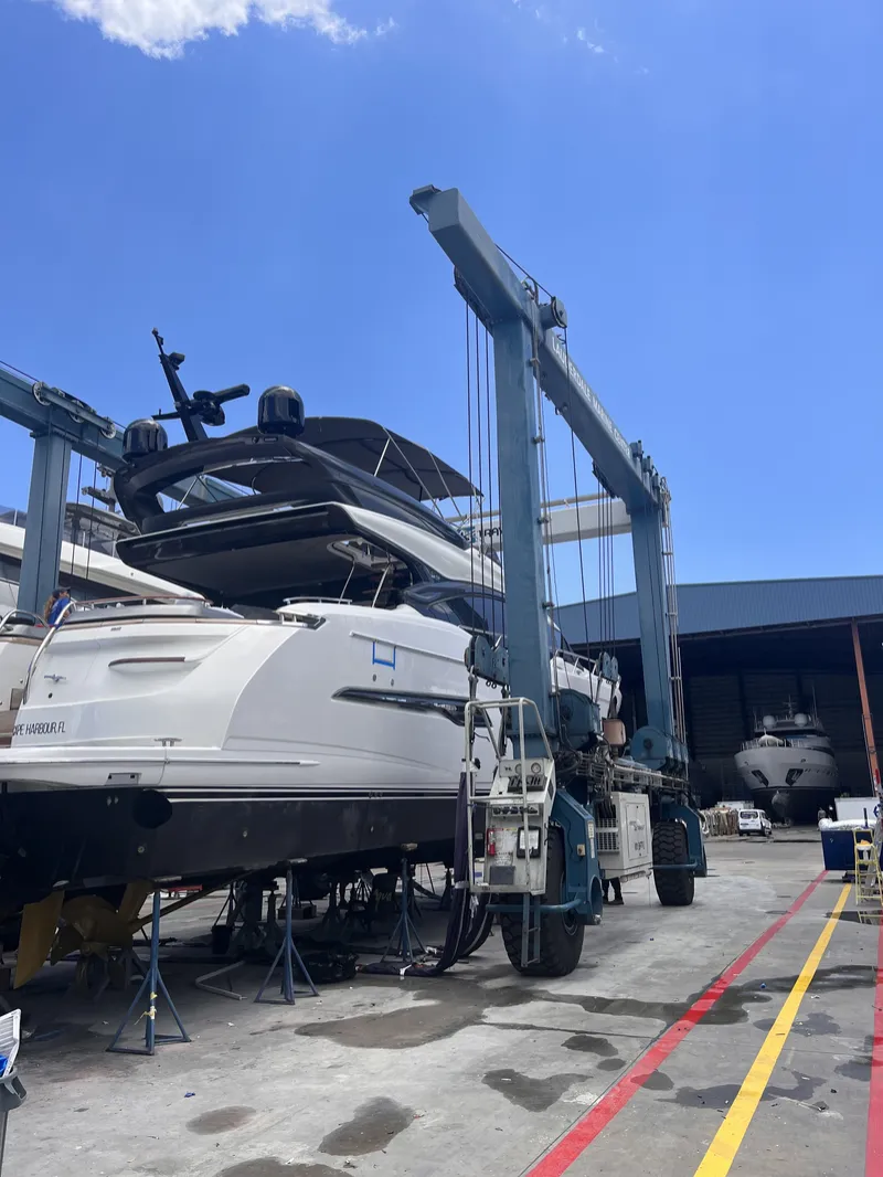 Princess S78 in the travel lift at Lauderdale Marine Center
