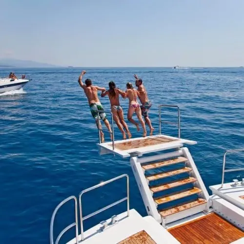 Guests using an Opacmare swim ladder