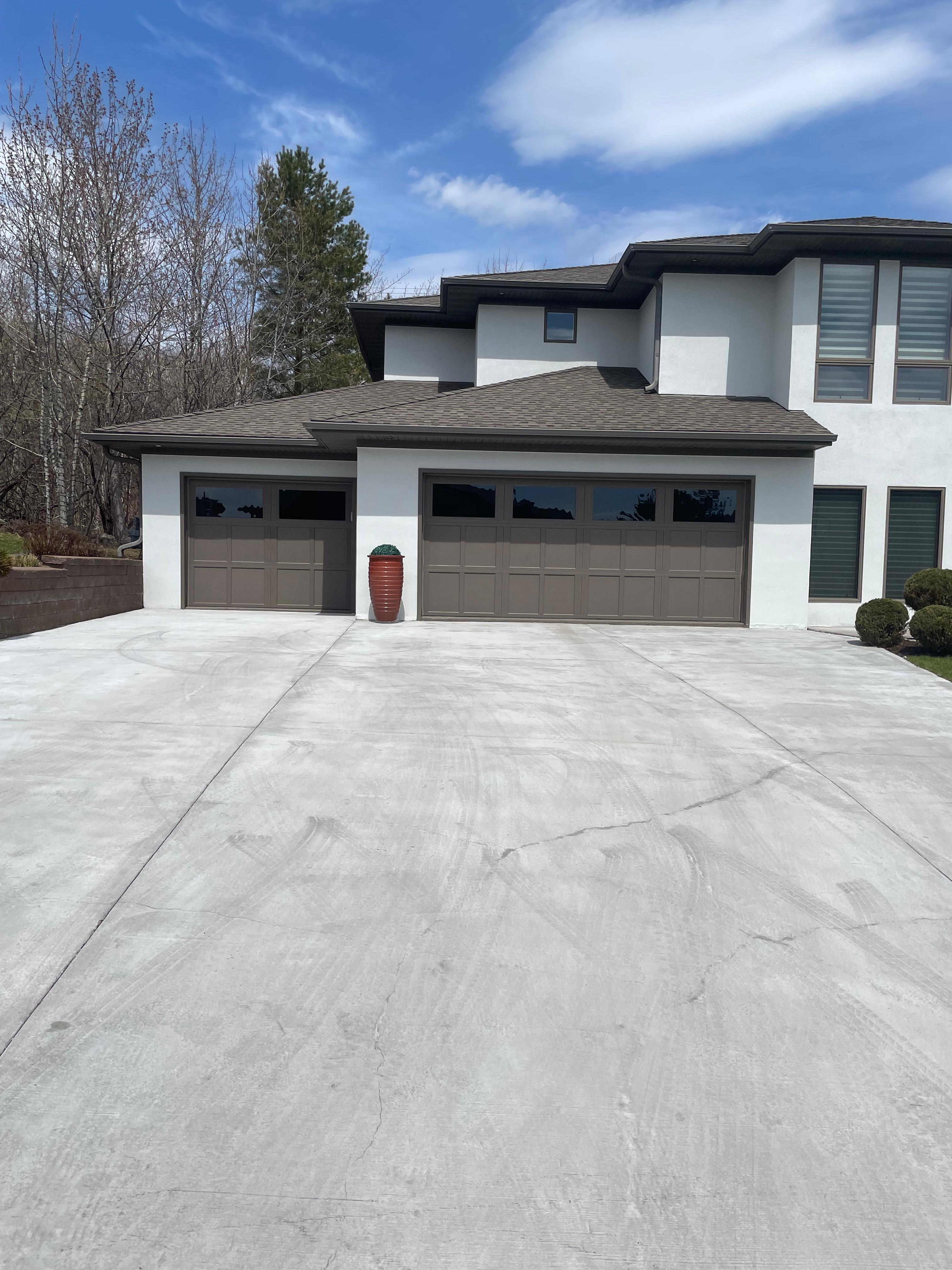 Concrete driveway and garage apron before surface cleaning, Duluth MN