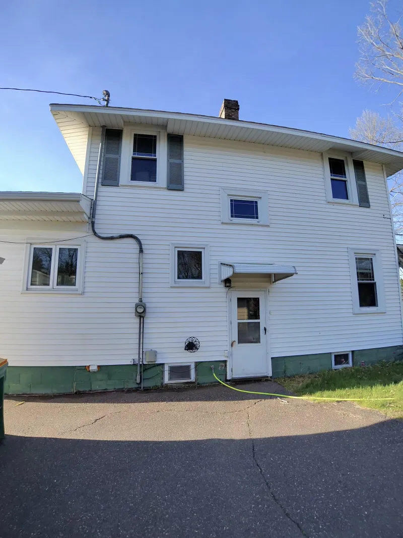White two-story home with clean siding after a soft wash in Duluth, Minnesota