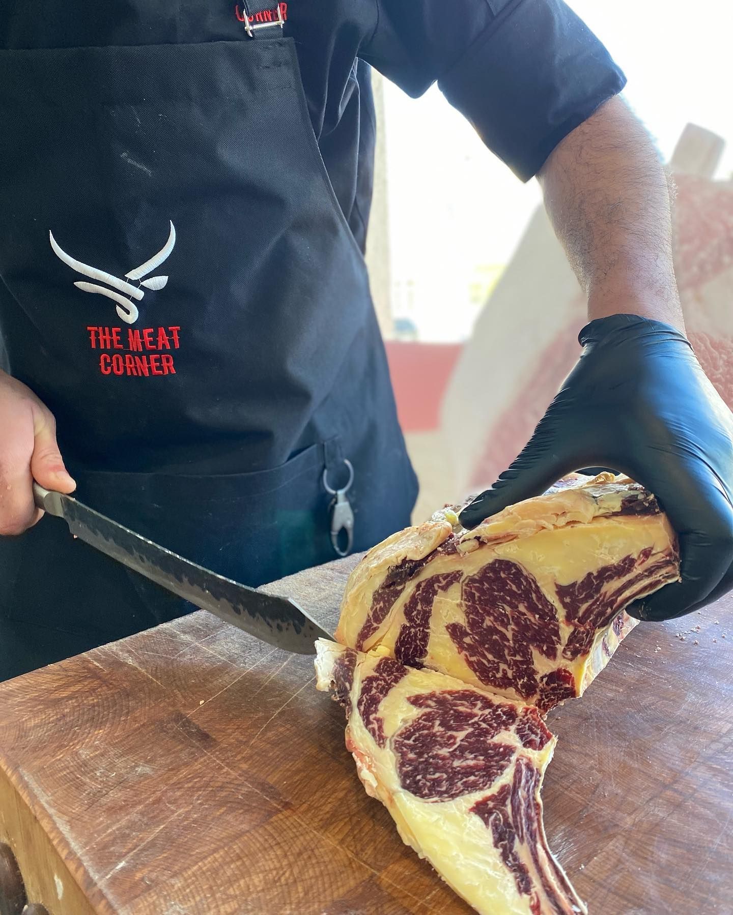 Butcher Cutting Meat