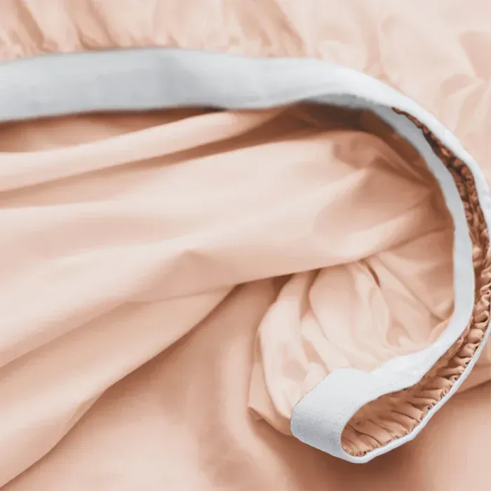 PureCare Weightless Cotton Sheets in Blush Pink, folded