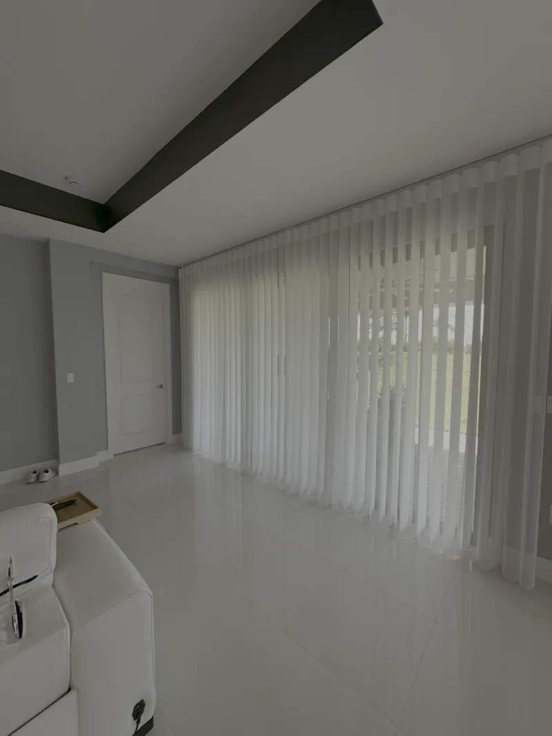 Glades Panels drawn across a wall of sliding doors in a living room