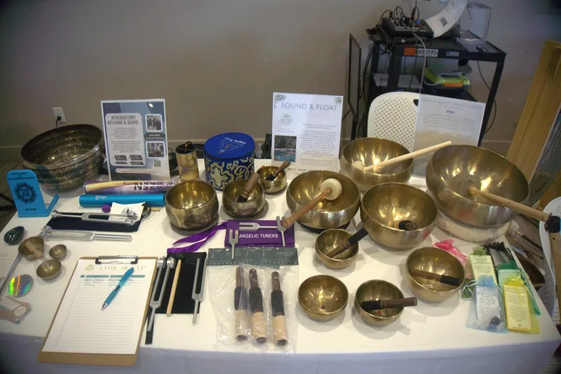 Singing bowls and tuning forks on a vendor table