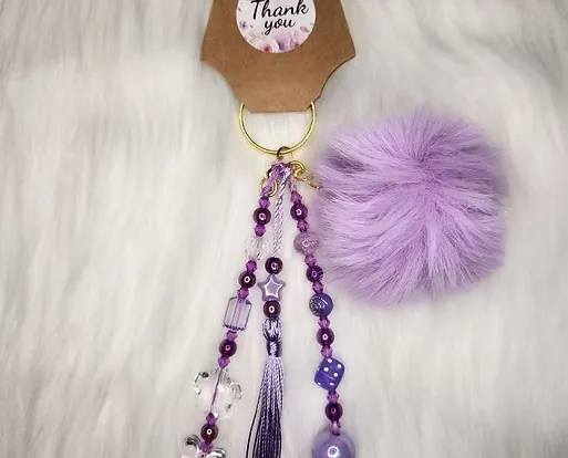 Colgante con pompón