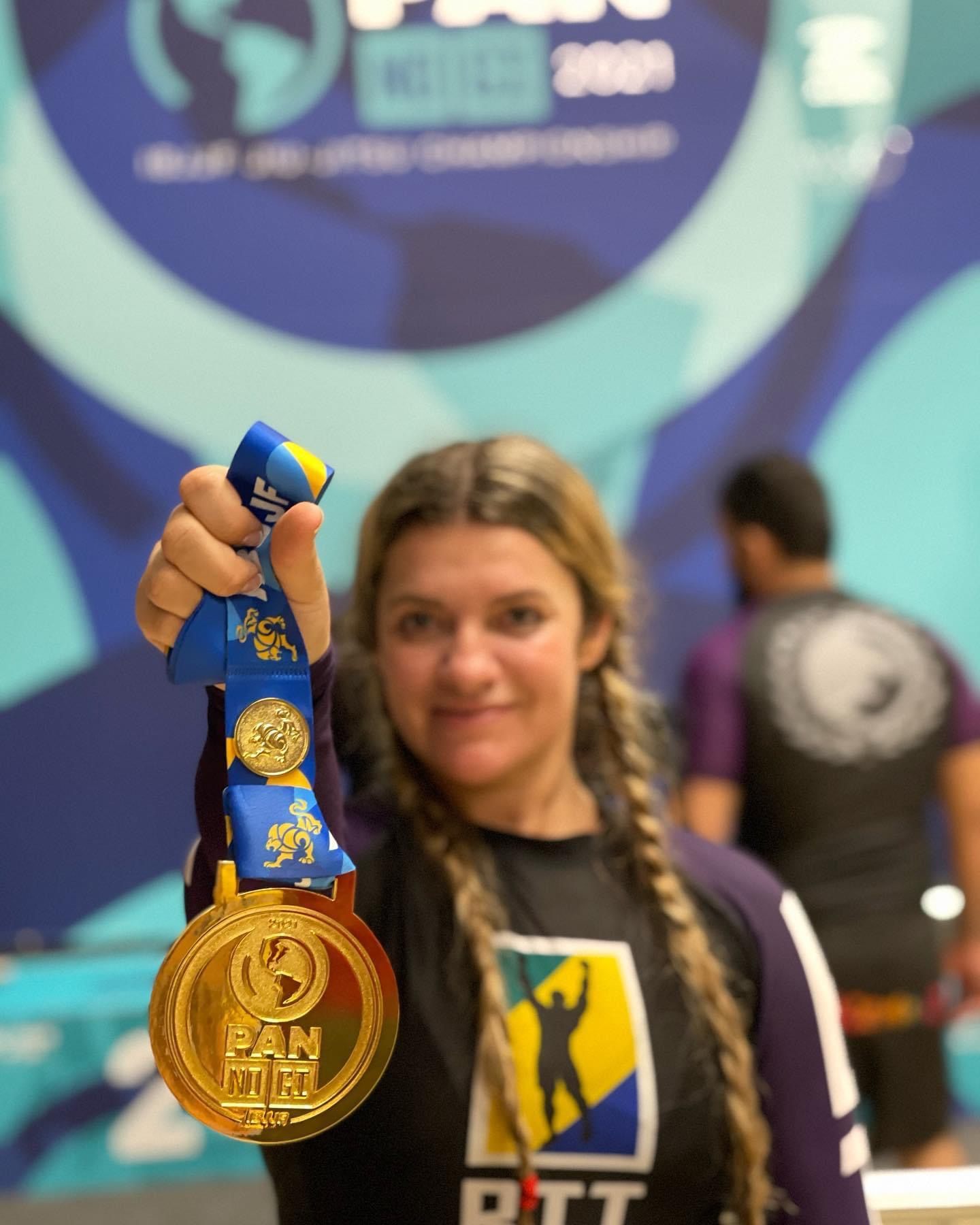 Prof. Denise Gamonal with her Pan American Championship gold medal