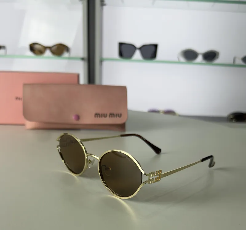 Miu Miu - Metal Frame Oval Brown Lenses 