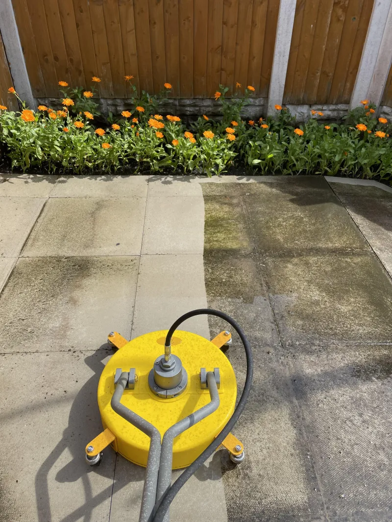 Rotary surface cleaner on a patio