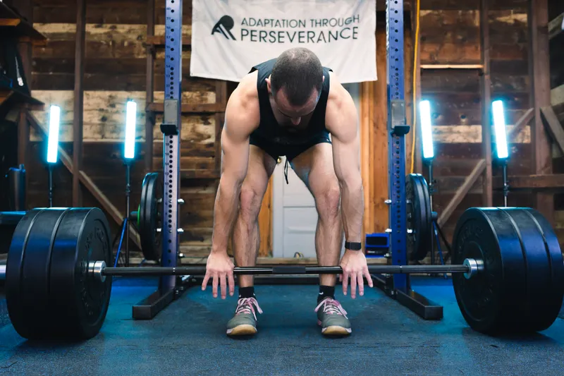 Jonathan setting up for a deadlift under the ATP banner