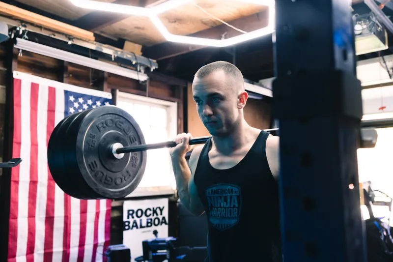 Jonathan under the bar for a back squat