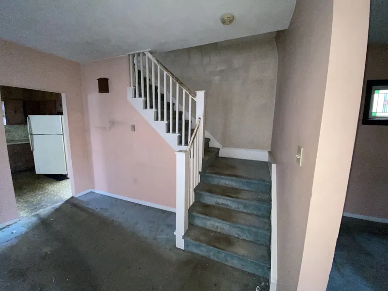 Entry and staircase before renovation