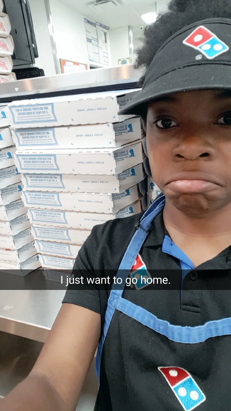 AJ at her first job, at Domino&rsquo;s, after a long shift
