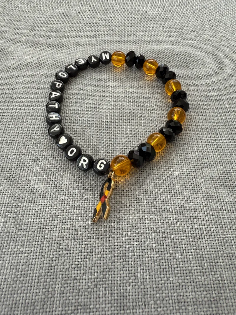 Bracelet - Handmade With Myelopathy.org Beads & Various Charms