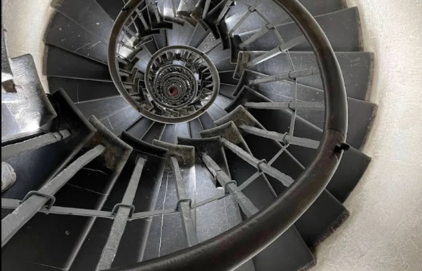 Looking up the spiral staircase of The Monument, London